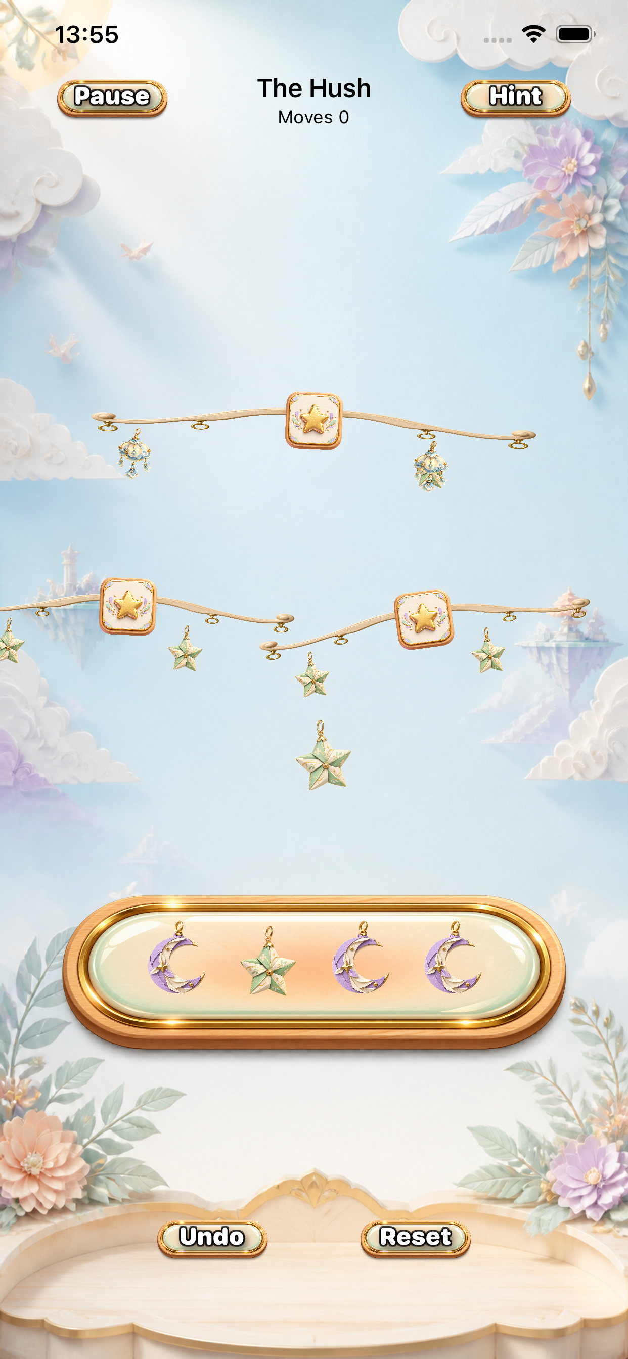 A Hush and Hover puzzle level with star and moon charms